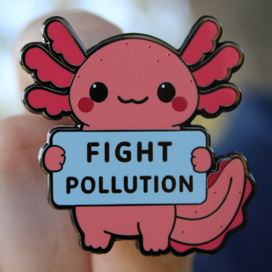 Cartoon axolotl holding a 'Fight Pollution' sign with a blurred background