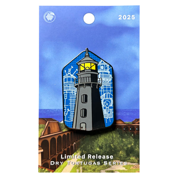 Garden Key Lighthouse enamel pin with yellow light and blueprint background
