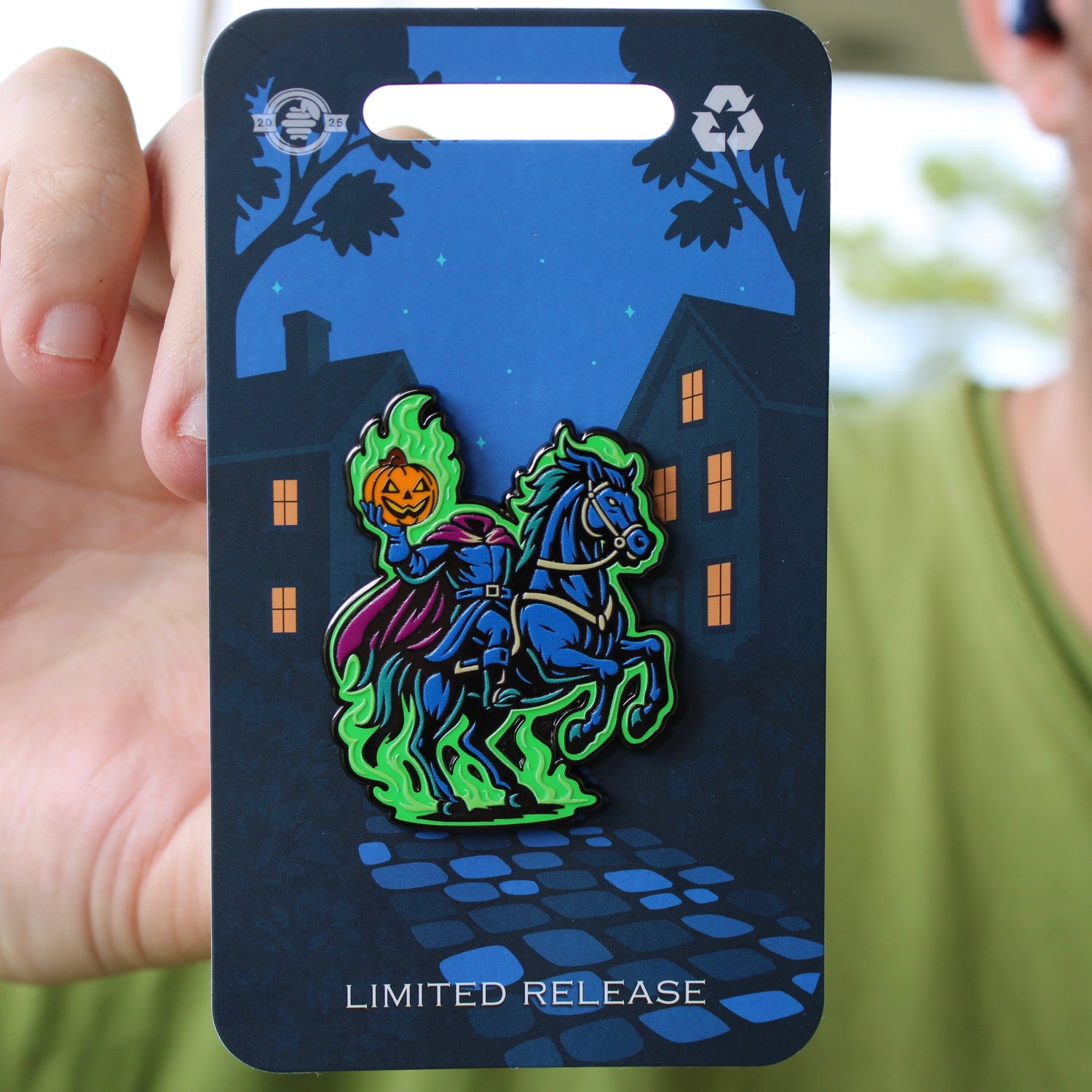 Headless Horseman enamel pin riding through Sleepy Hollow holding a jack-o’-lantern