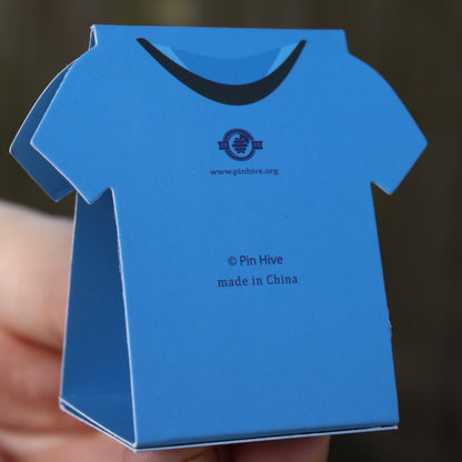 Side view of assembled scrub shaped display card being held upright 