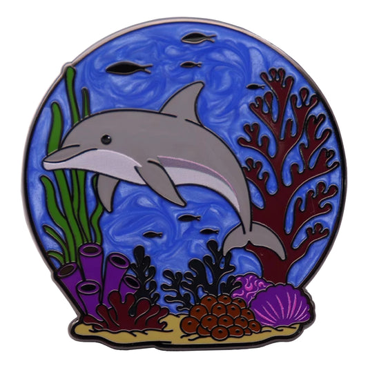 Bottlenose dolphin enamel pin on blue ocean backing card, limited release by Pin Hive