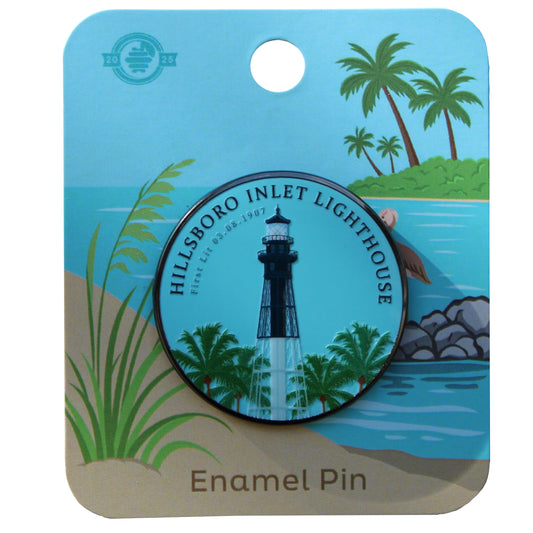 Enamel pin of Hillsboro Inlet Lighthouse on a decorative card with beach scenery