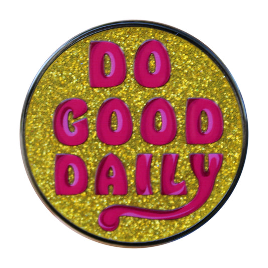 Circular badge with 'DO GOOD DAILY' text on a yellow glittery background